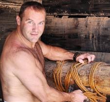 ranchers son working barn