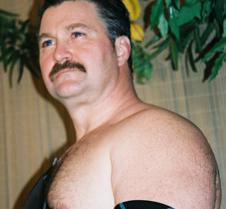 dads removing shirt beach resort