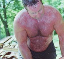 man sweating working hard