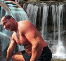 man swimming muscledaddy