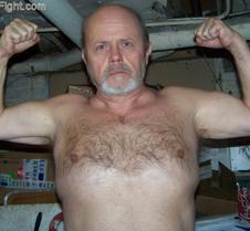 60older man flexing biceps