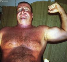 dads flexing big peaked biceps