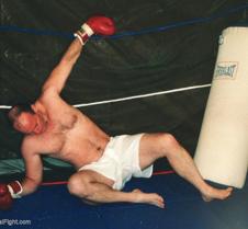 boxer knocked down to mats