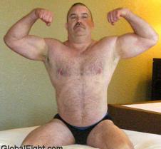 huge musclebear flexing