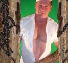 man undressing musclebear