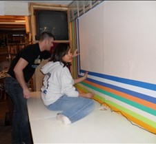 Eric & Vanessa Taping Wall