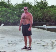 man walking beach photos