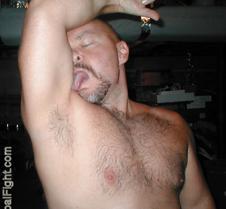 bear licking hairy biceps