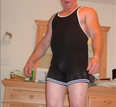 powerlifter older man posing singlet