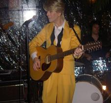 013 donning a guitar