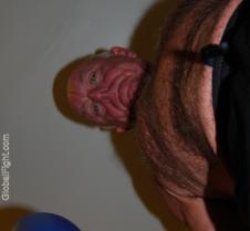 gray haired man boxing