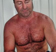 baseball coach stretching legs