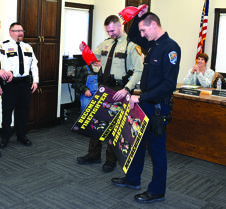 officers get firehats, posters