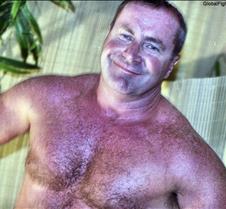 handsome man smiling tuff wrestler