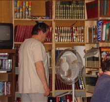 Dad, Bart looking in books