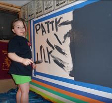 Lily paints Patty's name too