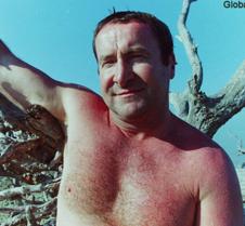 man fishing coast beach