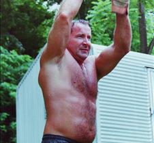 man swinging sledgehammer