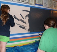 Lily and Patty Paining the Wall