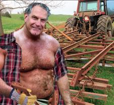 man working on tractor