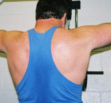 huge back muscles hairy shoulders guy