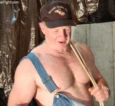 man working wearing overalls