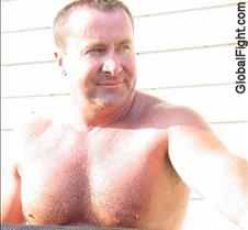 working on car shirtless