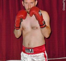 boxer dude wearing satin boxing trunks